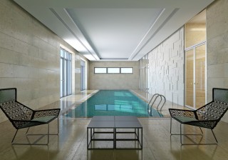 Piscina interior rectangular desbordante